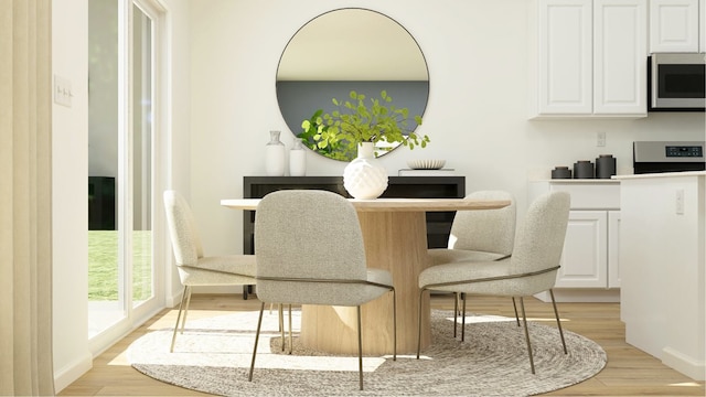 dining room with light wood-type flooring