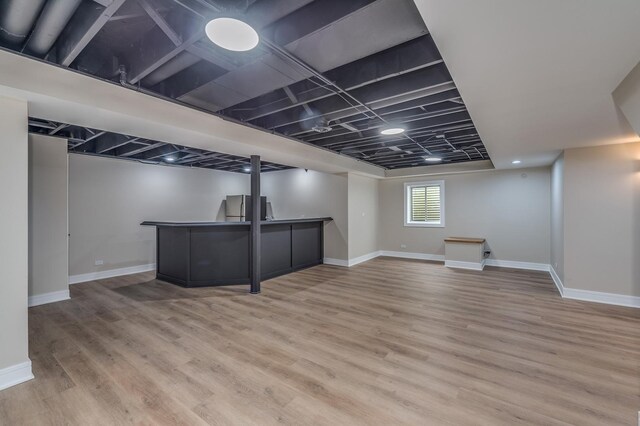 living area with wood-type flooring