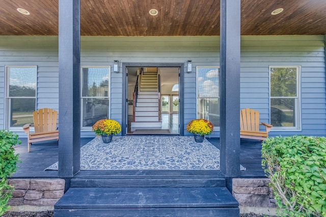 doorway to property with a porch