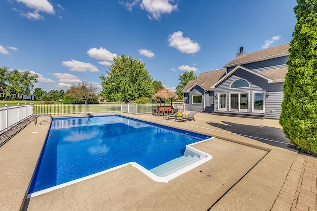 view of pool featuring a patio