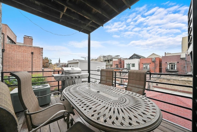 balcony with grilling area and central AC unit