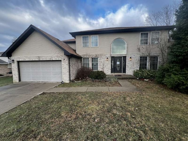 front of property with a garage and a front lawn