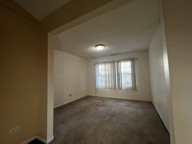 unfurnished room featuring carpet floors