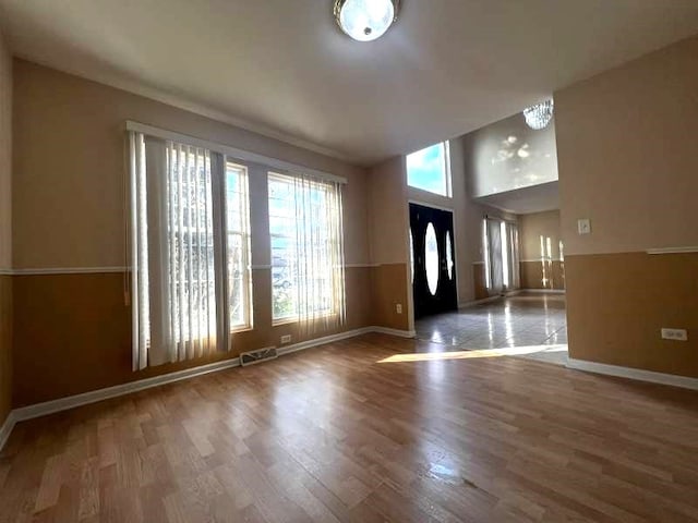 foyer entrance with hardwood / wood-style floors