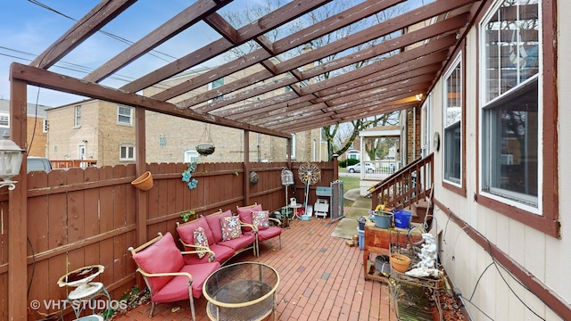 view of patio featuring a pergola and an outdoor living space