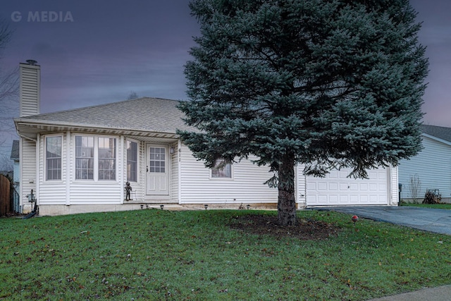 view of front of home featuring a yard