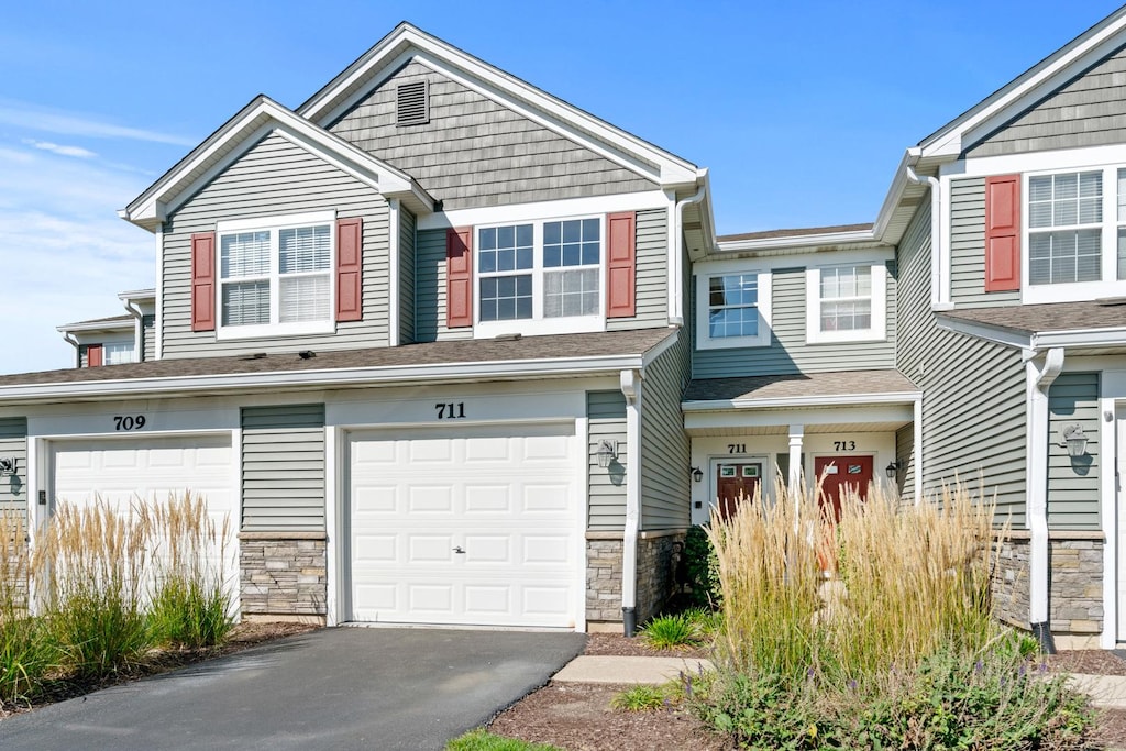 view of front of property featuring a garage