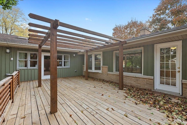 wooden deck featuring a pergola