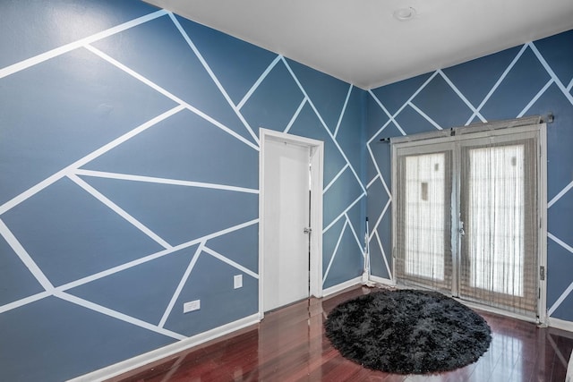 entrance foyer with hardwood / wood-style flooring