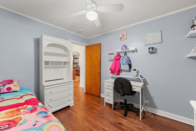 bedroom with ceiling fan, dark hardwood / wood-style flooring, and ornamental molding