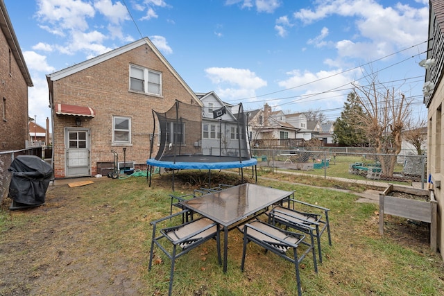 view of yard featuring a trampoline