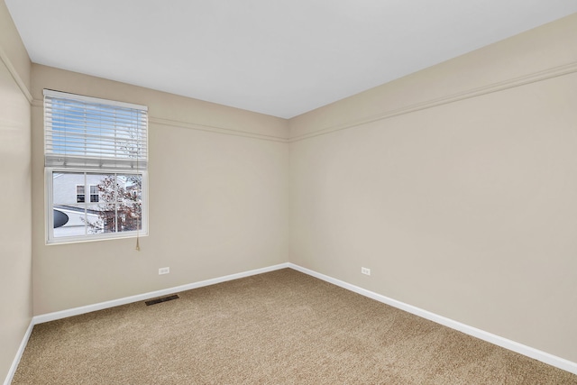 empty room with carpet flooring