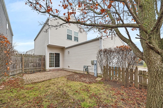 back of house featuring a patio