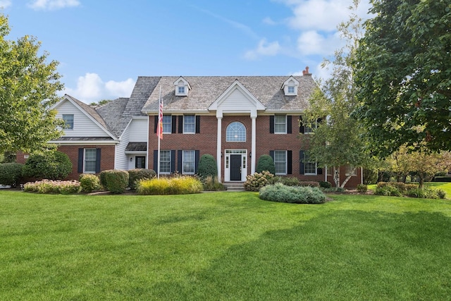 view of front of property with a front lawn