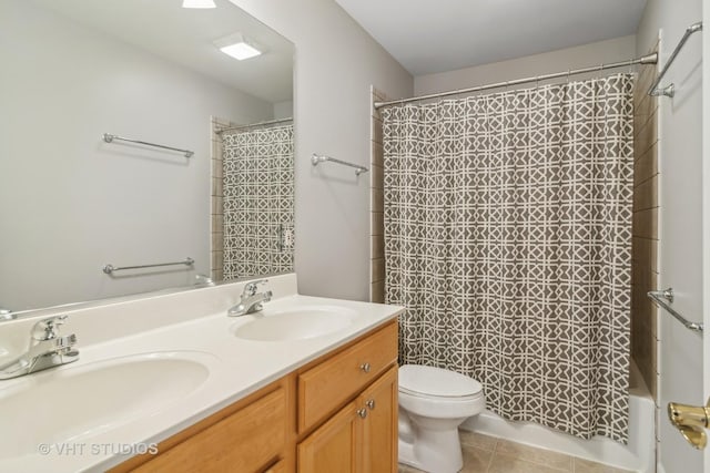 full bathroom with tile patterned flooring, vanity, toilet, and shower / tub combo with curtain