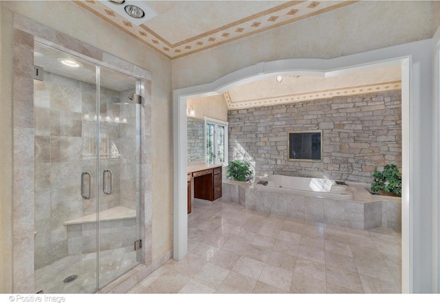 bathroom featuring vanity and shower with separate bathtub