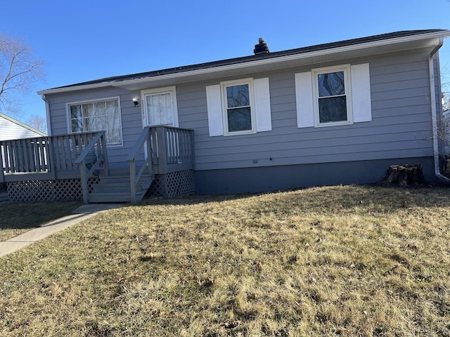 view of front of property with a front yard