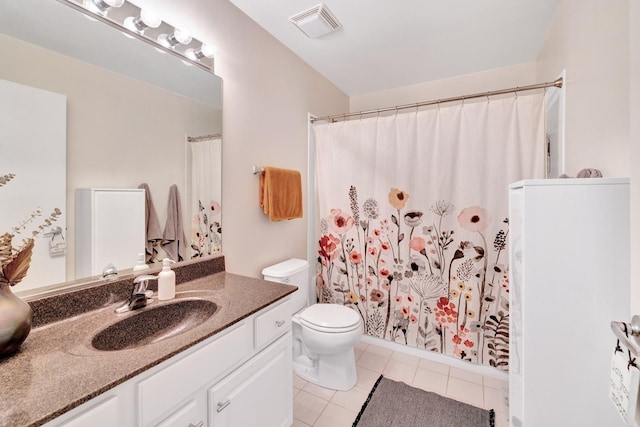 bathroom with walk in shower, tile patterned flooring, vanity, and toilet