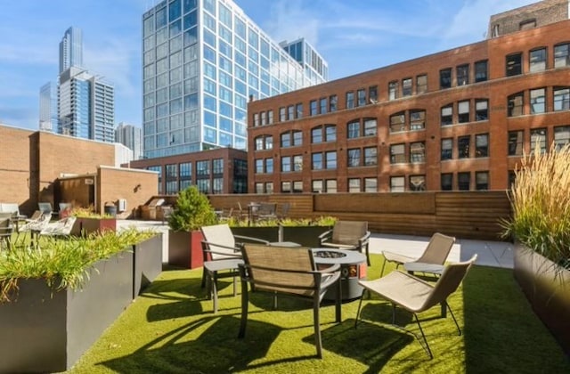 view of patio with an outdoor fire pit