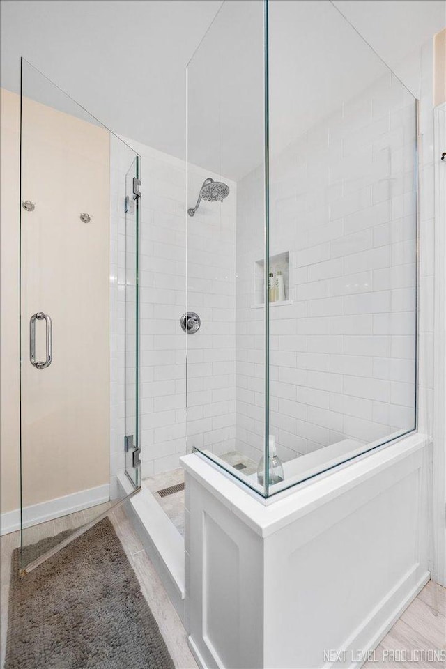 bathroom with an enclosed shower