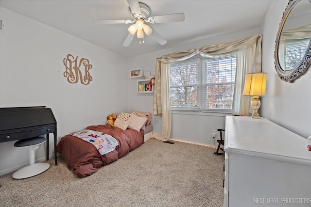 bedroom with ceiling fan and carpet floors