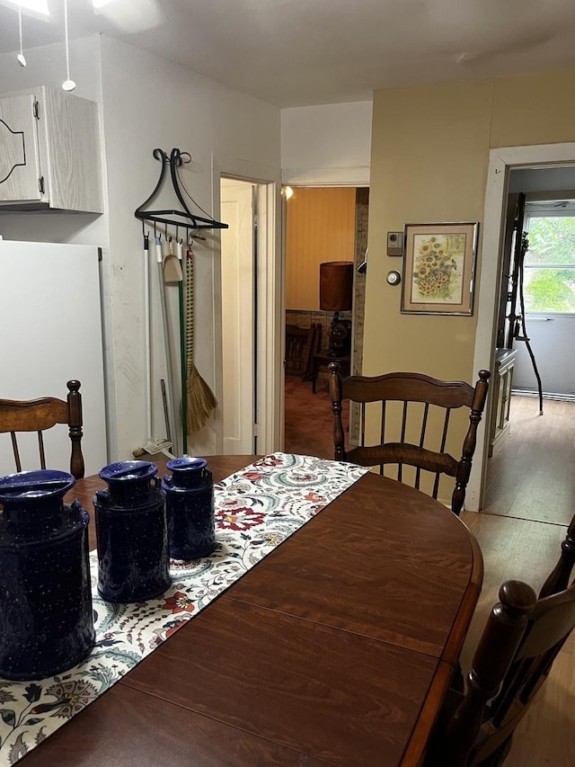 dining space featuring light hardwood / wood-style flooring