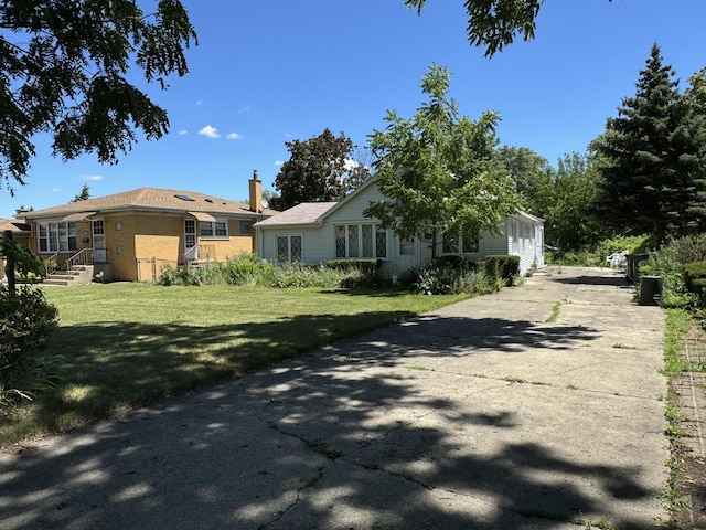 view of front of home with a front yard