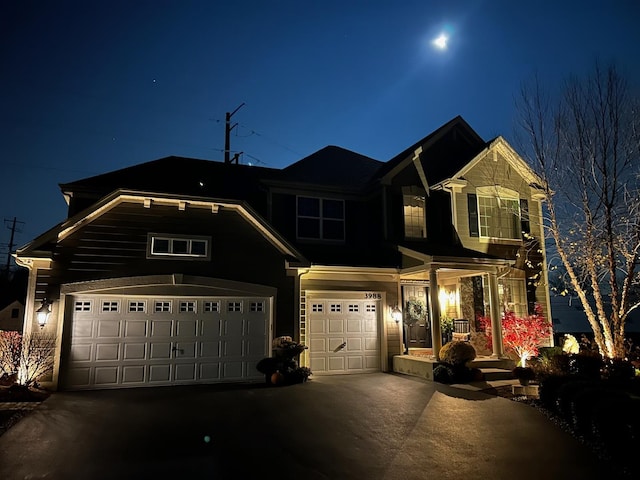 view of front of property with a garage