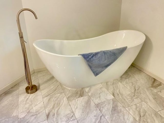 bathroom with a washtub