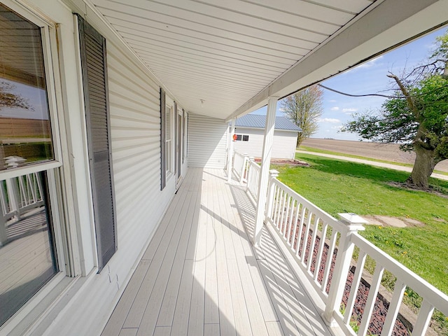 174 Rockyford Rd, Sublette, IL 61367 - wooden porch with a lawn