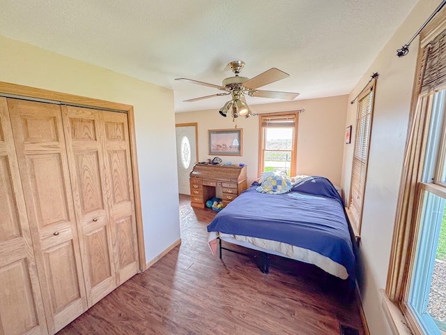174 Rockyford Rd, Sublette, IL 61367 - bedroom featuring wood finished floors, a ceiling fan, and baseboards
