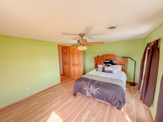 174 Rockyford Rd, Sublette, IL 61367 - bedroom featuring wood finished floors, ceiling fan, and baseboards