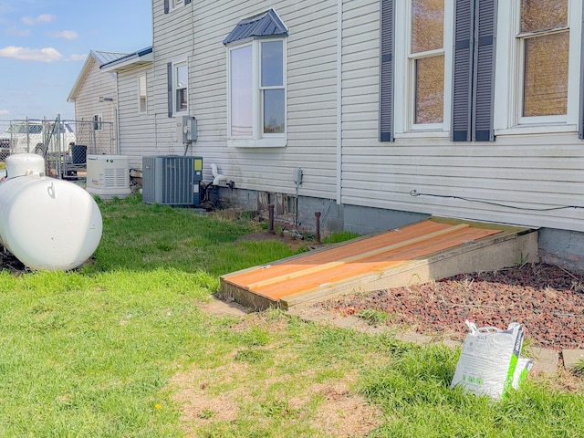 174 Rockyford Rd, Sublette, IL 61367 - view of side of home with central AC unit and a lawn