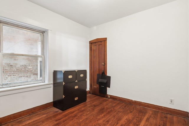 interior space with dark hardwood / wood-style flooring