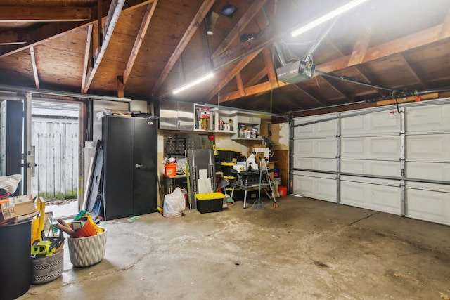 garage featuring a garage door opener