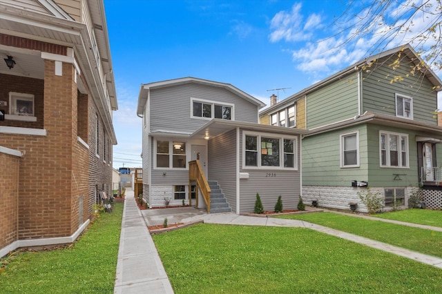 view of front facade featuring a front yard