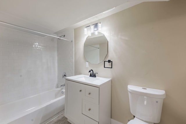 full bathroom featuring vanity, toilet, and tiled shower / bath