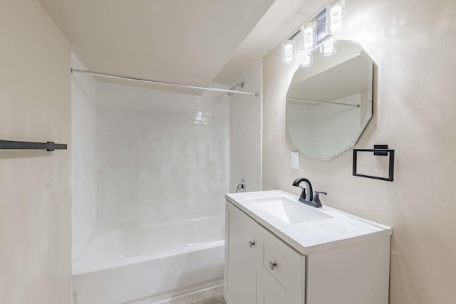 bathroom featuring vanity and tiled shower / bath combo