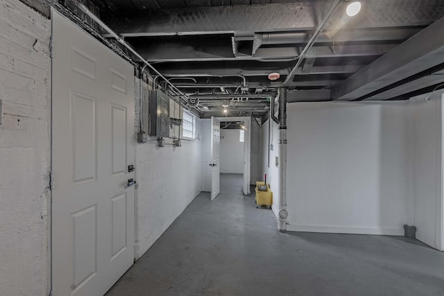 basement featuring electric panel