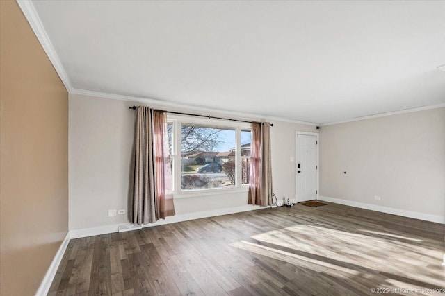 unfurnished room with hardwood / wood-style flooring and ornamental molding