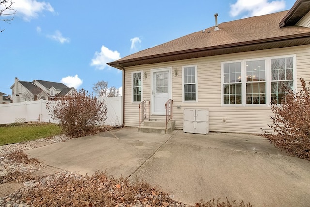 rear view of house featuring a patio