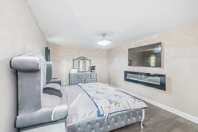 bedroom featuring dark hardwood / wood-style floors