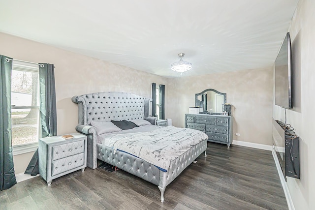 bedroom featuring dark hardwood / wood-style floors