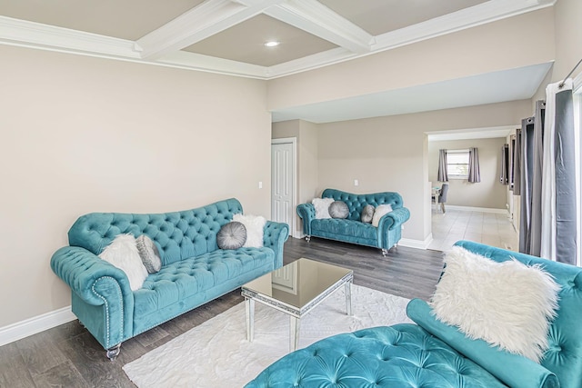 living room with beam ceiling, dark hardwood / wood-style flooring, coffered ceiling, and ornamental molding