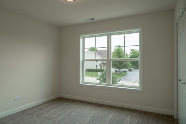 empty room featuring carpet