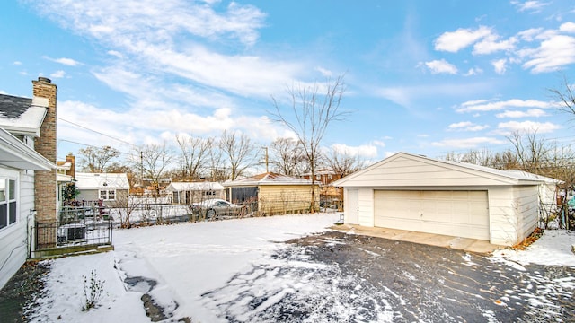 view of snow covered garage