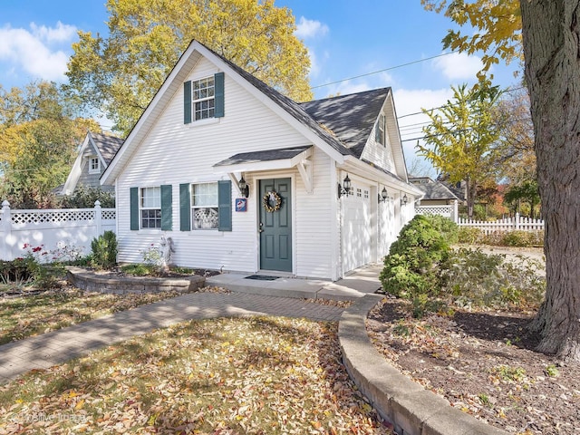 view of front of property with a garage