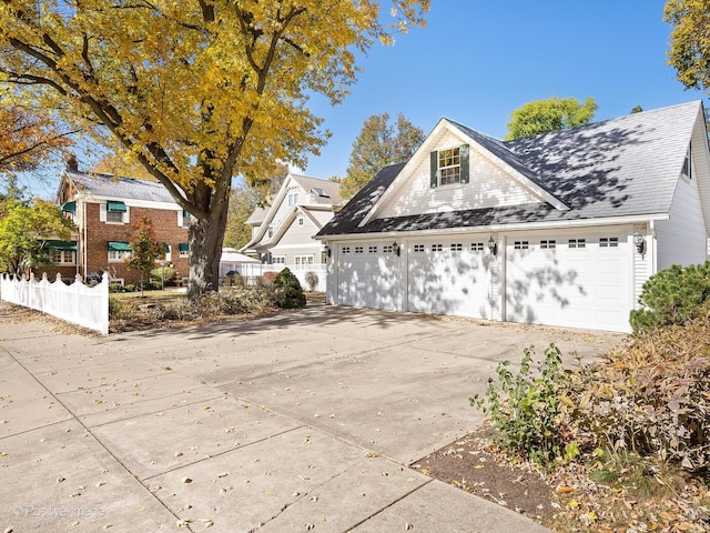 view of property exterior featuring a garage