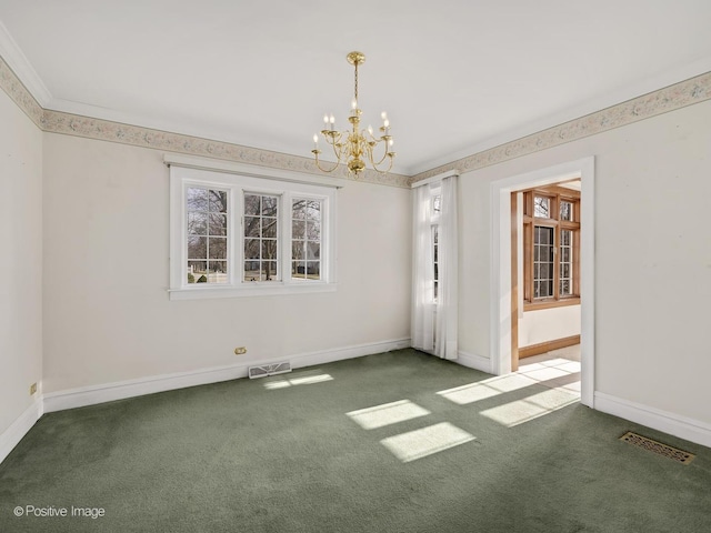 empty room with a chandelier and dark carpet