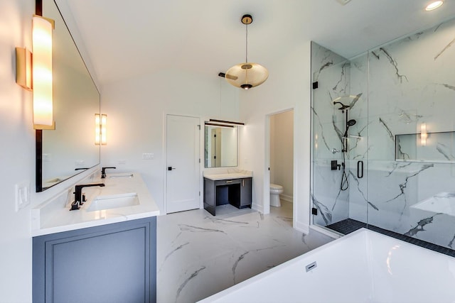 full bathroom with vanity, toilet, lofted ceiling, and independent shower and bath